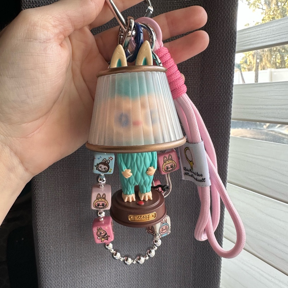 Labubu the monsters almost hidden series lamp bag charm